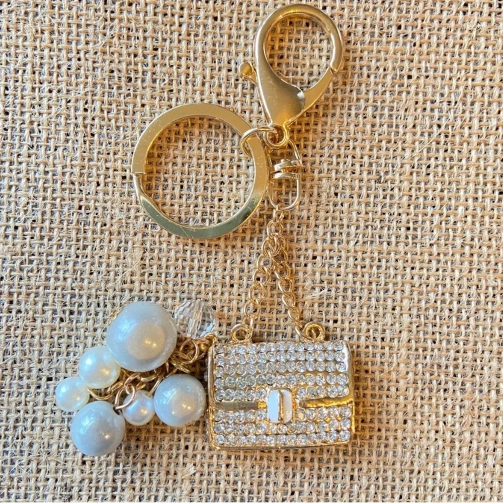 Lot of key chains rings with faux pearls bag airplane teacher in mixed tones
